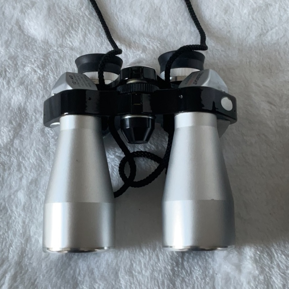 Vintage bushnell silver  and Black Binoculars Tasco
